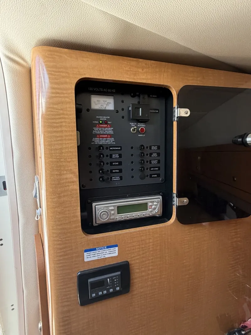 Slide: The Image of Electrical control panel in a 2006 Chaparral Signature boat. - 14