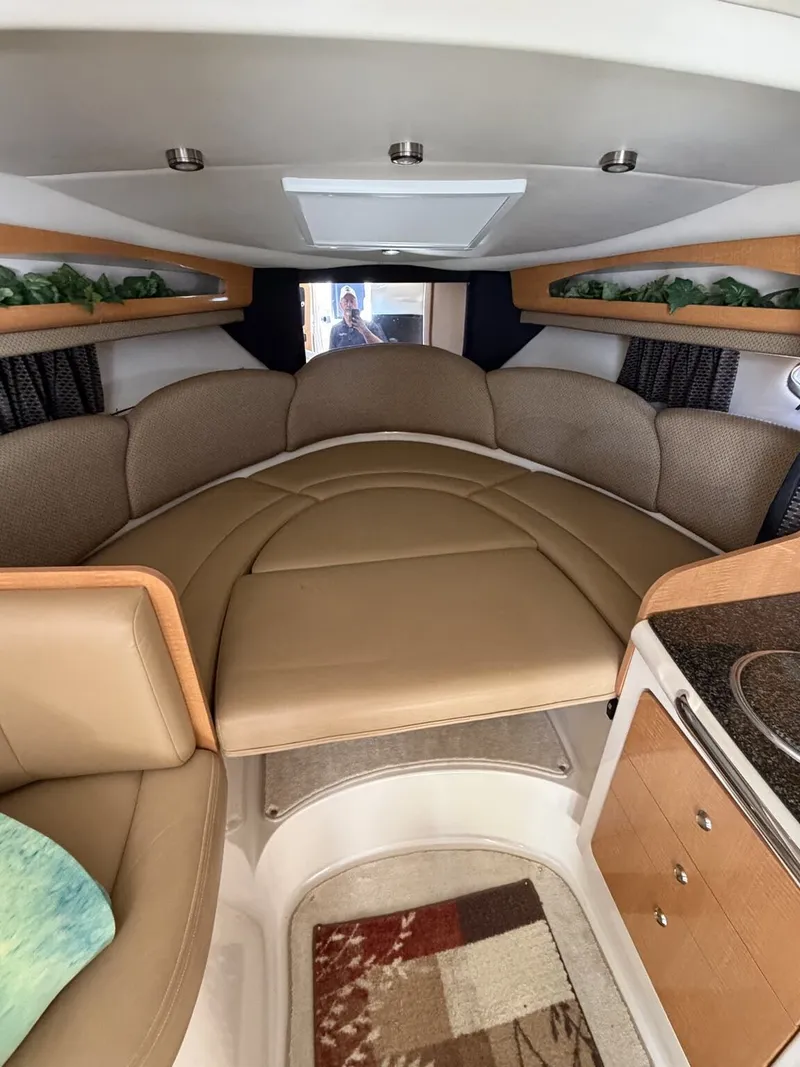 Slide: The Image of Interior of a 2006 Chaparral Signature yacht with cozy cabin. - 15