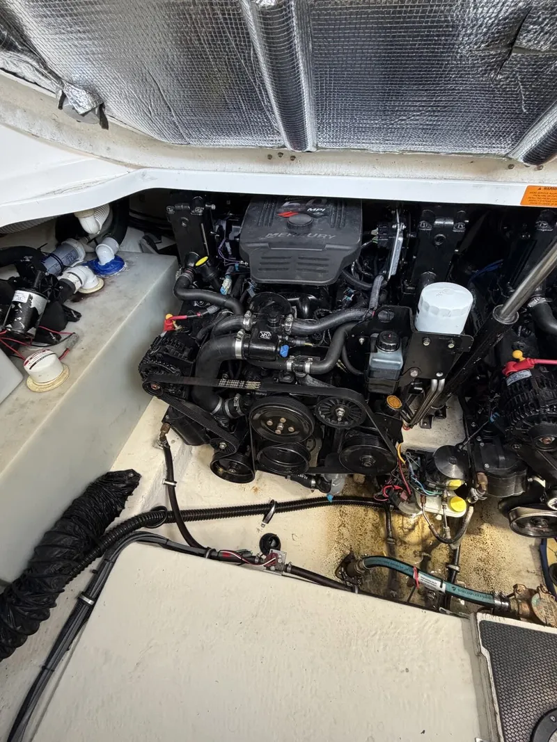Slide: The Image of Engine compartment of a 2006 Chaparral Signature boat. - 16