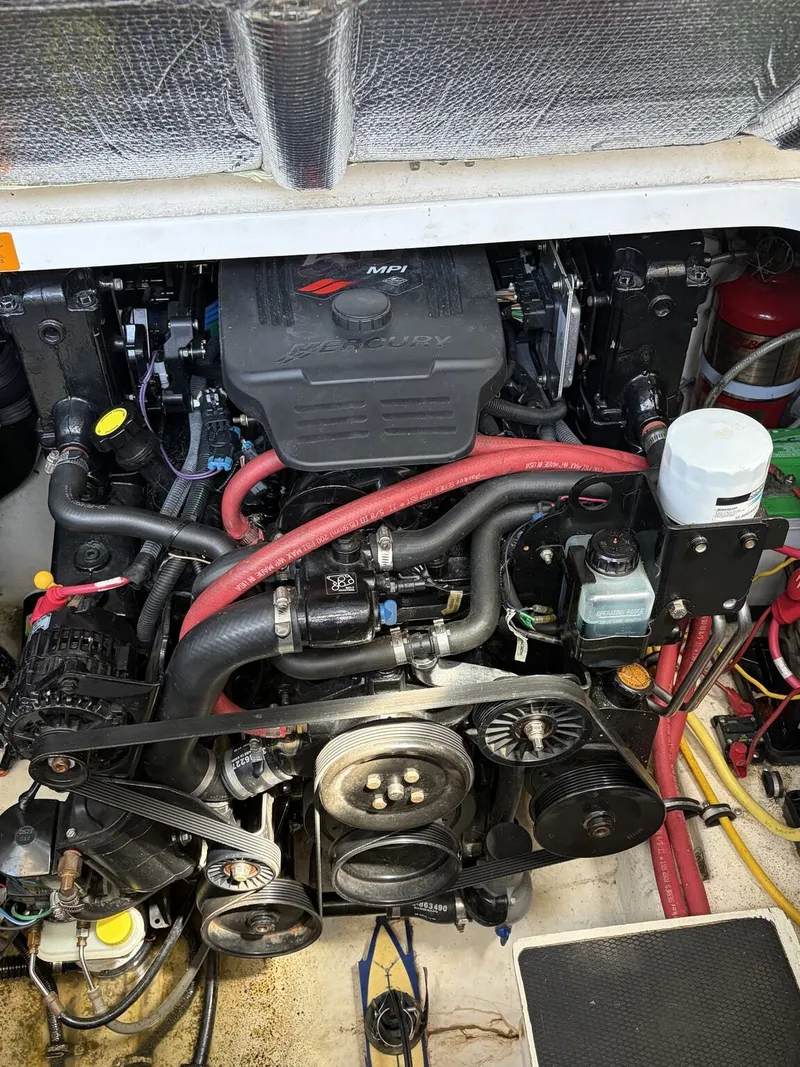 Slide: The Image of Engine compartment of a 2006 Chaparral Signature boat with Mercury MPI engine. - 17