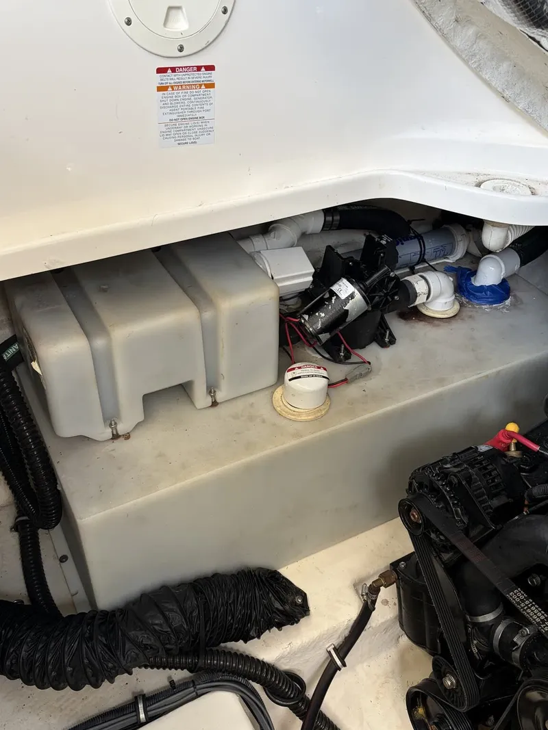 Slide: The Image of Interior of a 2006 Chaparral Signature boat with technical components. - 18