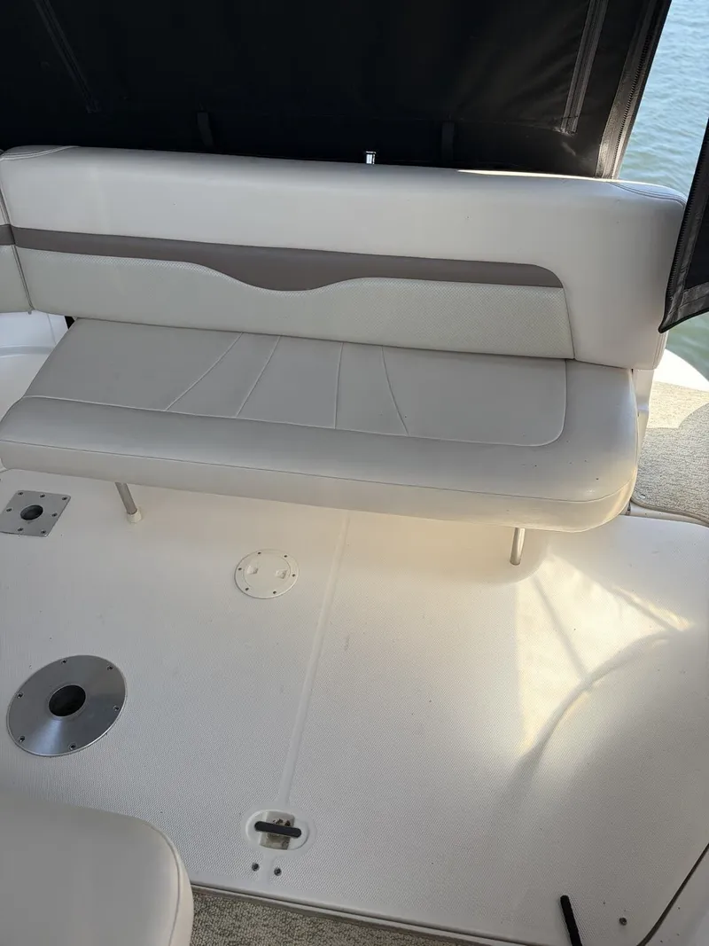 Slide: The Image of Interior of a 2006 Chaparral Signature with white seating. - 7
