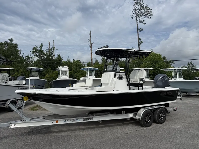 The Image of 2026 Sea Pro 230 Bay boat with YAMAHA 200 engine on trailer. - 1