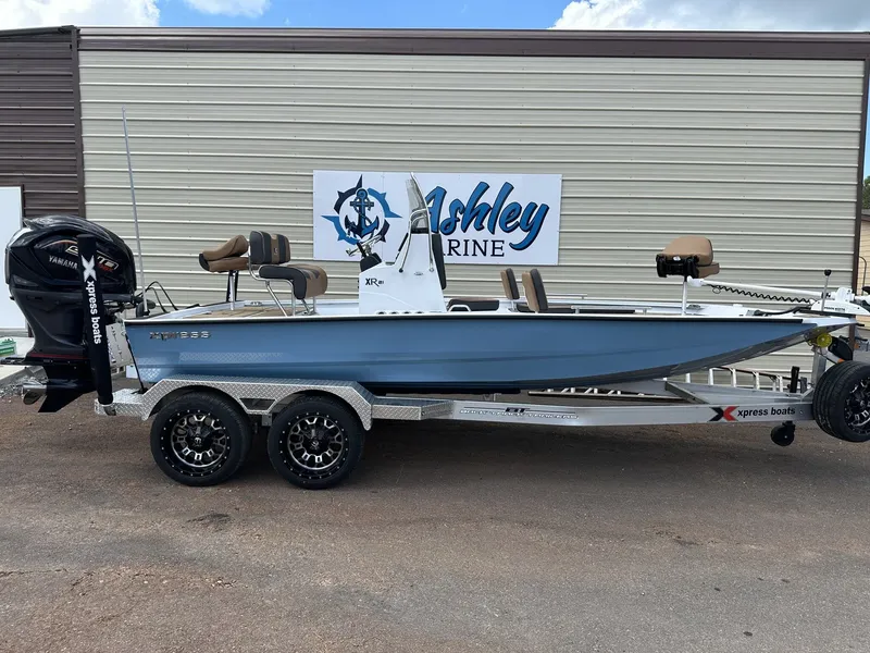 The Image of 2026 Xpress Xclusive XR 21 Bay boat with trailer. - 1