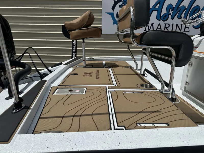 Slide: The Image of 2026 Xpress Xclusive XR 21 Bay boat with forward seating. - 8