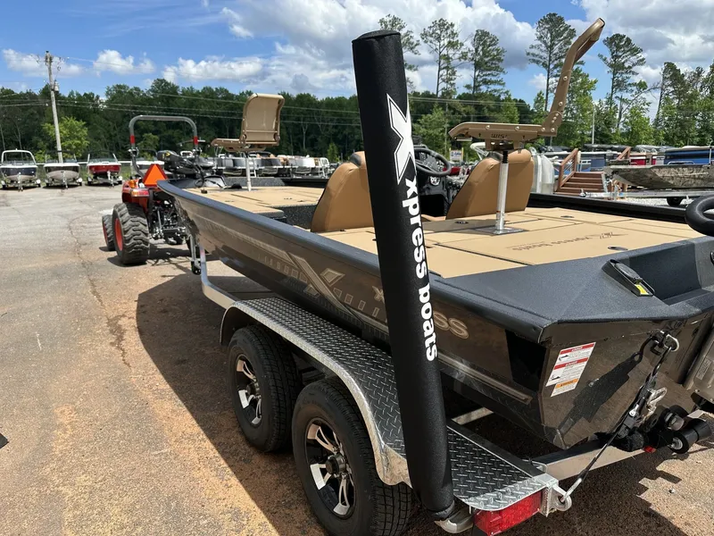 Slide: The Image of 2026 Xpress H20C Crappie boat on trailer outdoors. - 5