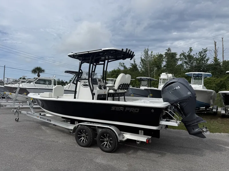 Slide: The Image of 2026 Sea Pro 230 Bay boat with YAMAHA 200 engine on trailer. - 2