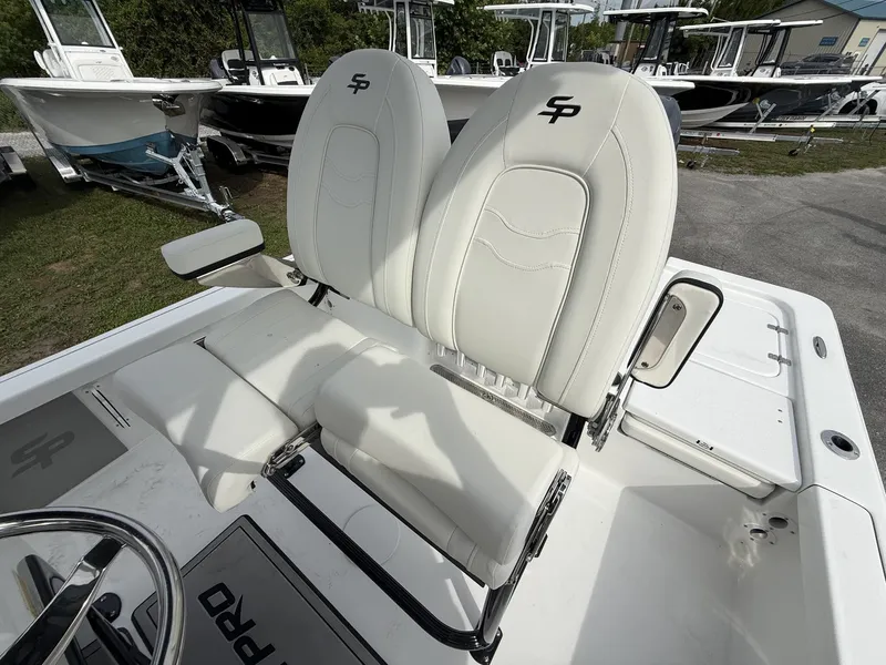 Slide: The Image of Interior of Sea Pro 230 Bay boat, white seats, year 2026. - 4