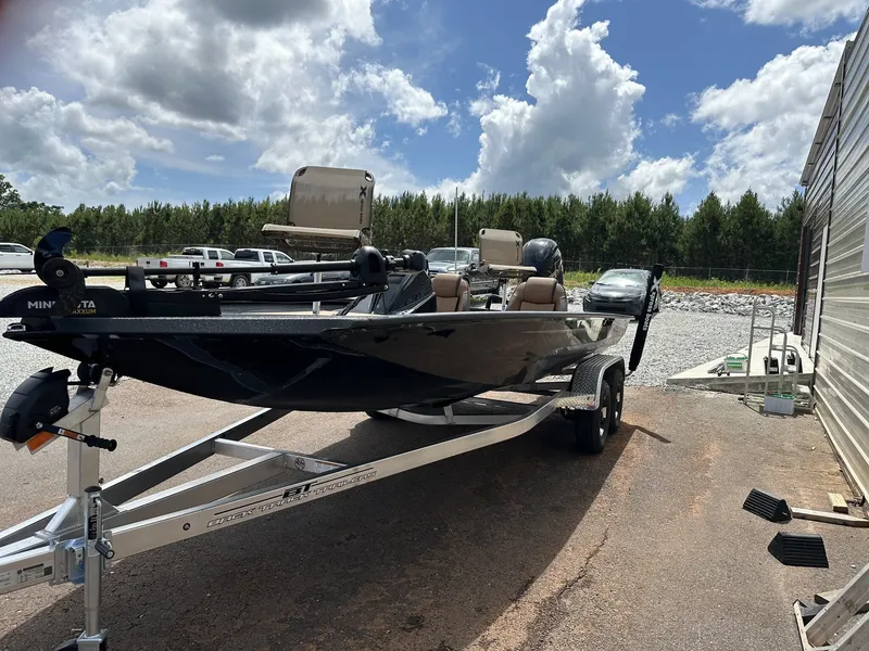 Slide: The Image of 2026 Xpress H20C Crappie boat on trailer in sunny weather. - 3