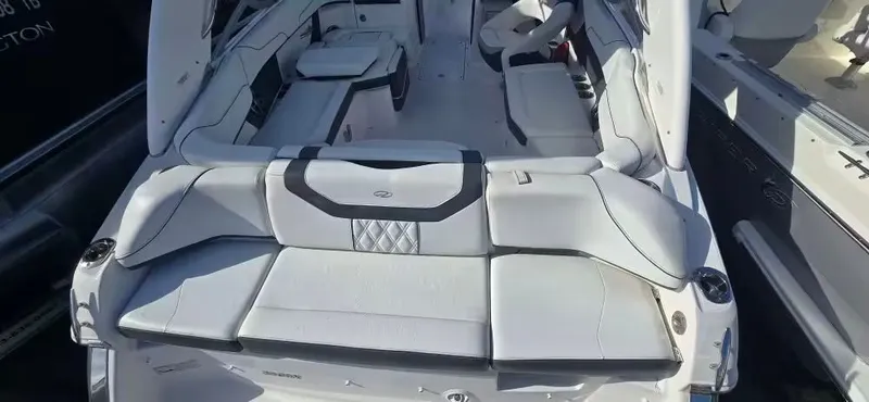Slide: The Image of Interior of a 2019 Regal 23 OBX boat with white upholstery. - 4