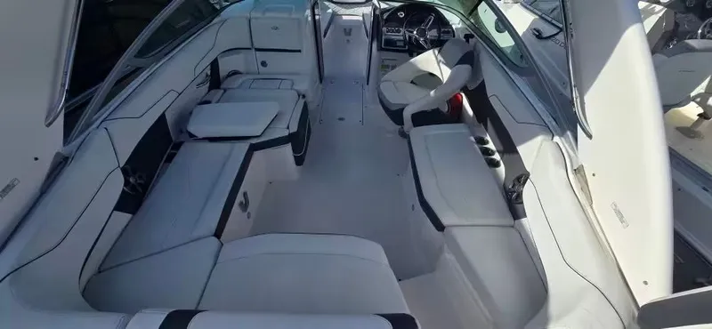 Slide: The Image of Interior of a 2019 Regal 23 OBX boat with luxurious seating arrangement. - 7