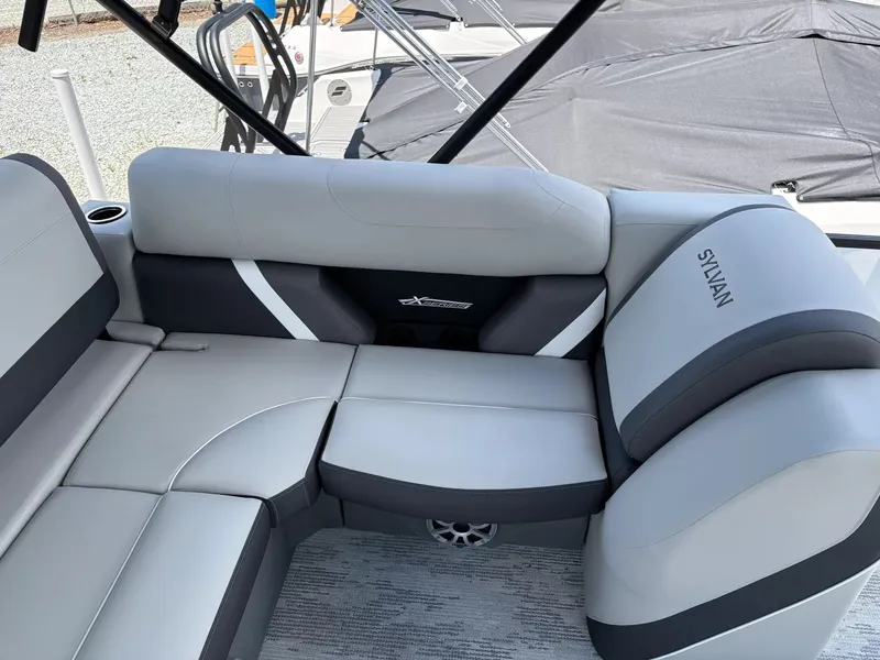 Slide: The Image of Sylvan X-3 DLZ BAR 2026, luxurious gray boat seating. - 14