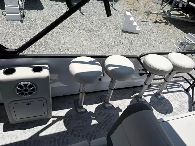 Slide: The Image of Sylvan X-3 DLZ BAR 2026 with bar stools and speaker. - 15