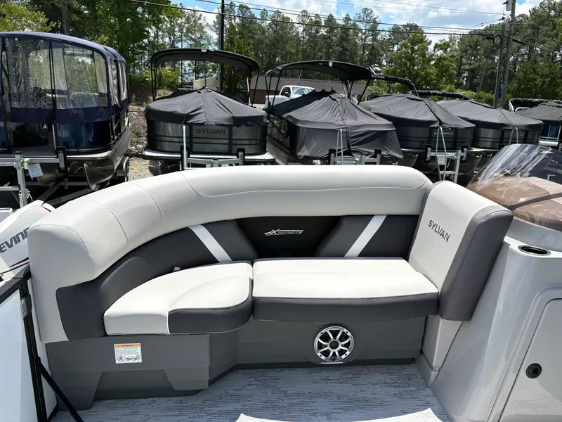 Slide: The Image of Sylvan X-3 DLZ BAR 2026 boat with luxurious seating. - 7