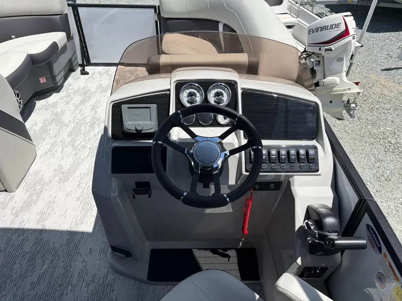 Slide: The Image of 2026 Sylvan X-3 DLZ BAR helm with Evinrude engine. - 9
