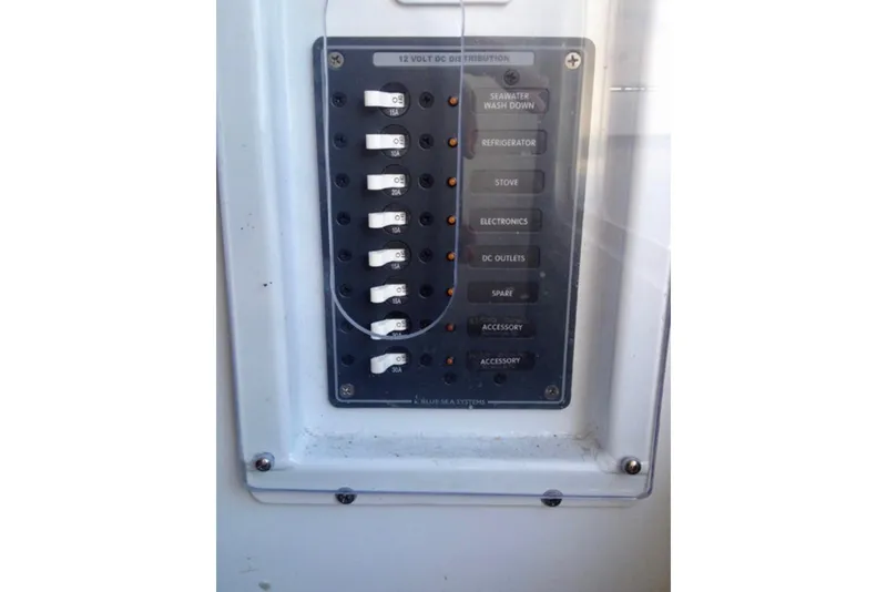 Slide: The Image of Electrical panel of ACB 28 Explorer 2008 with labeled switches for various functions. - 16