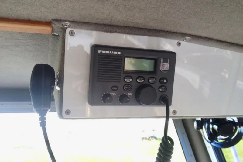 Slide: The Image of Radio equipment inside a 2008 ACB 28 Explorer boat. - 6