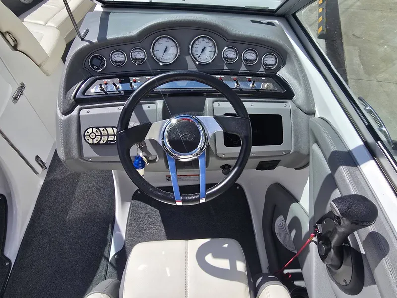 Slide: The Image of Interior view of a 2006 Cobalt 232 boat cockpit. - 15