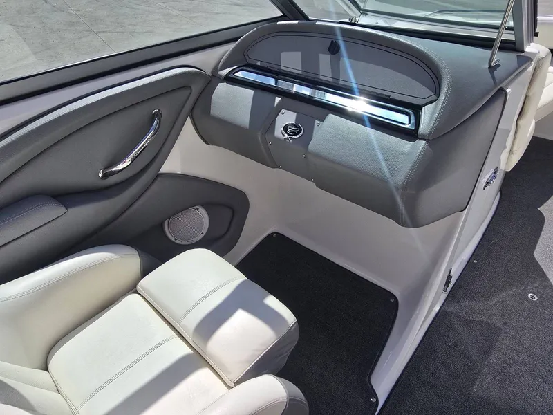 Slide: The Image of Interior of a 2006 Cobalt 232 boat with gray seating. - 17