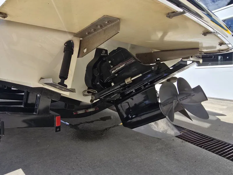 Slide: The Image of Rear view of a 2006 Cobalt 232 boat with drive and propeller. - 23