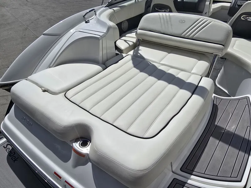 Slide: The Image of 2006 Cobalt 232 boat with luxurious sun lounge seating. - 9