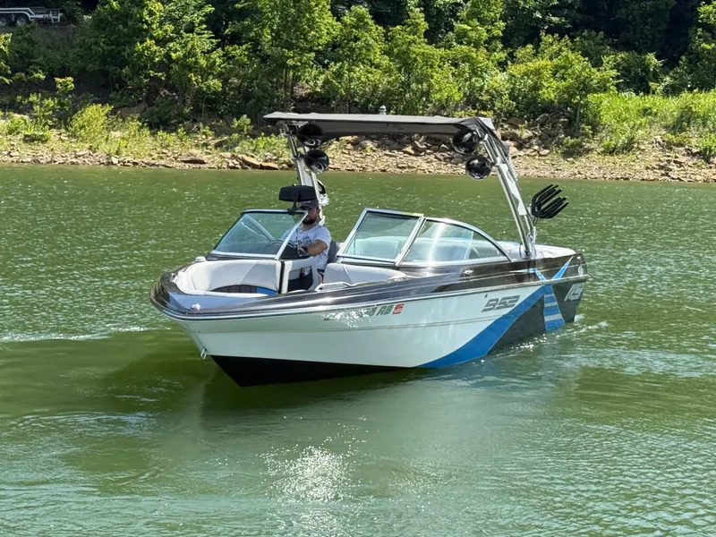 Slide: The Image of 2013 MB SPORTS B52 boat on a calm lake. - 20
