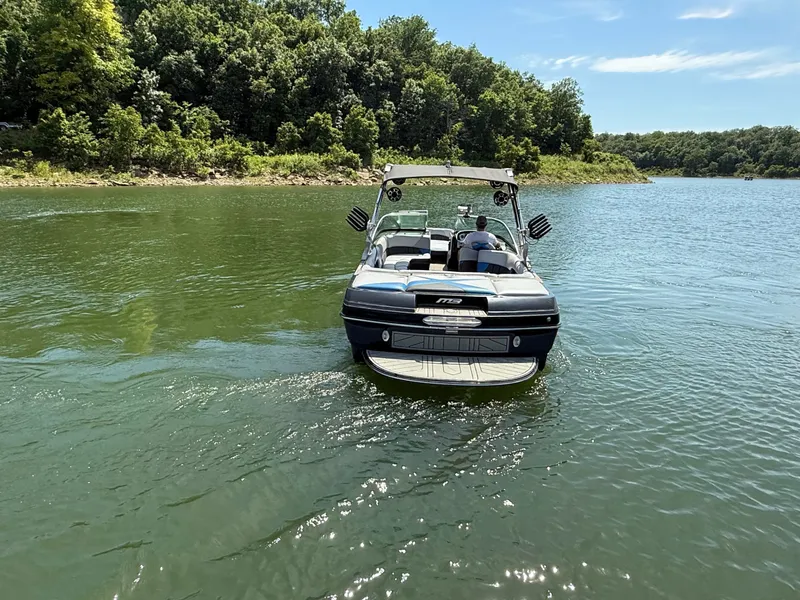 Slide: The Image of 2013 MB SPORTS B52 boat on a tranquil lake. - 27