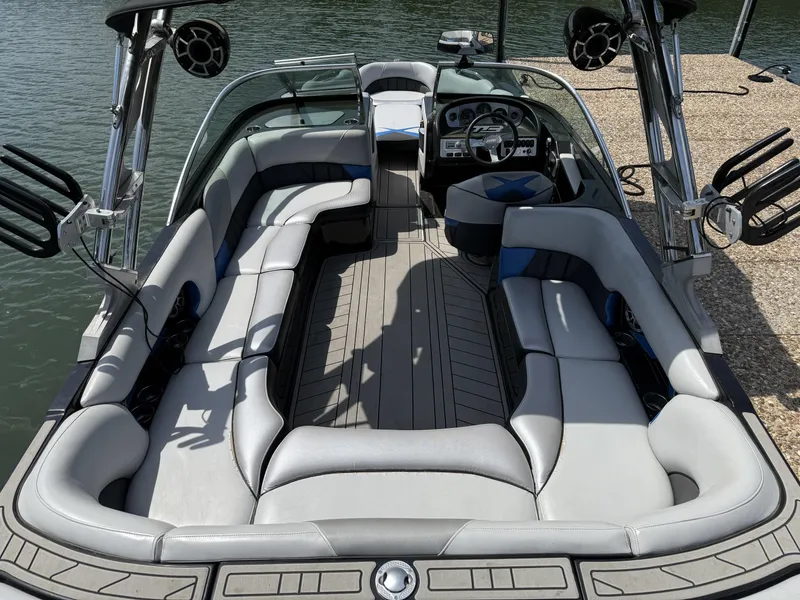 Slide: The Image of Interior of a 2013 MB SPORTS B52 boat with gray seating. - 4