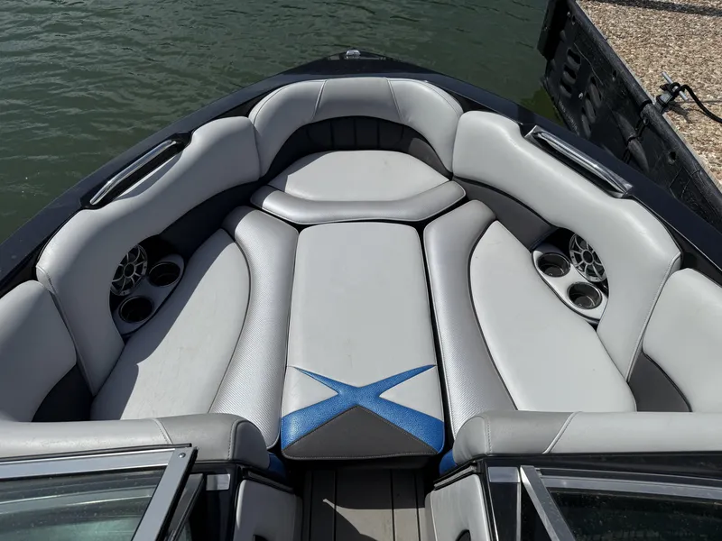 Slide: The Image of 2013 MB SPORTS B52 boat with gray upholstery and speakers. - 6