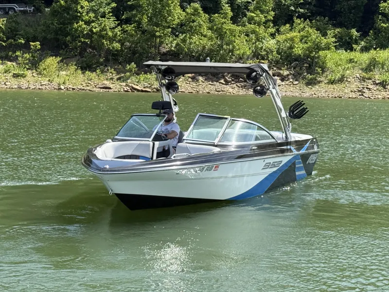 Slide: The Image of 2013 MB SPORTS B52 boat on a calm lake. - 8