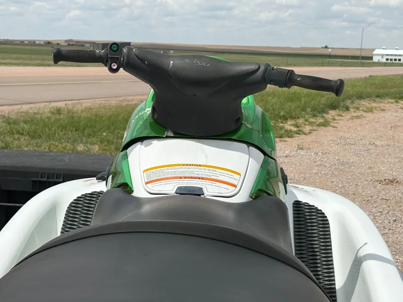 The Image of 2003 Kawasaki 1200 STX-R jet ski on a trailer. - 1