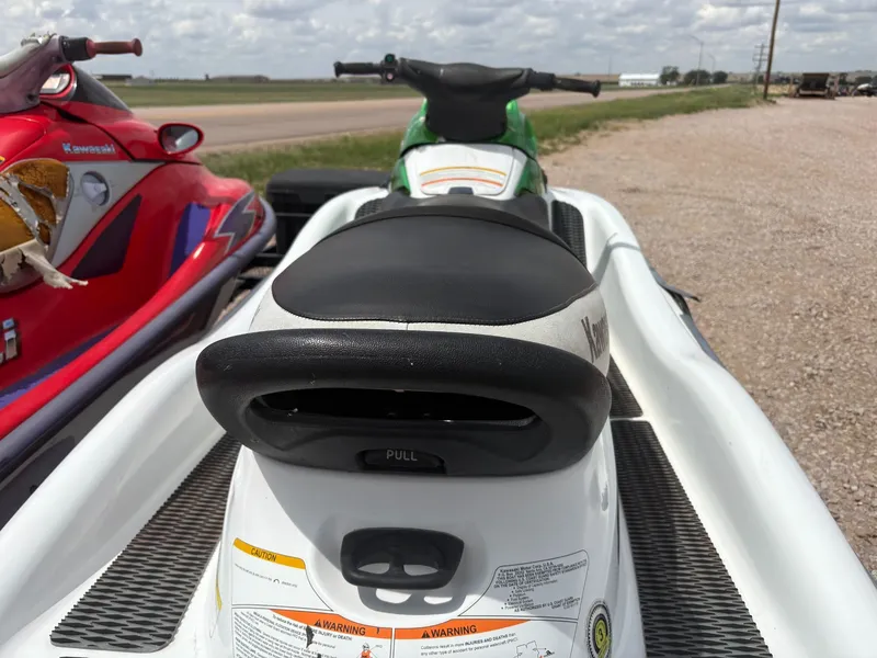 Slide: The Image of 2003 Kawasaki 1200 STX-R jet ski on a trailer. - 6