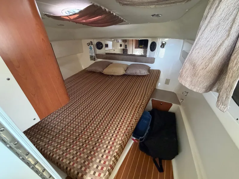 Slide: The Image of Interior of 2016 World Cat 320 EC with cozy bed. - 29
