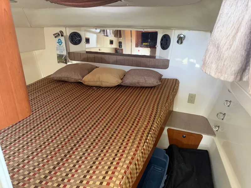Slide: The Image of Interior of a 2016 World Cat 320 EC with cozy bed. - 30