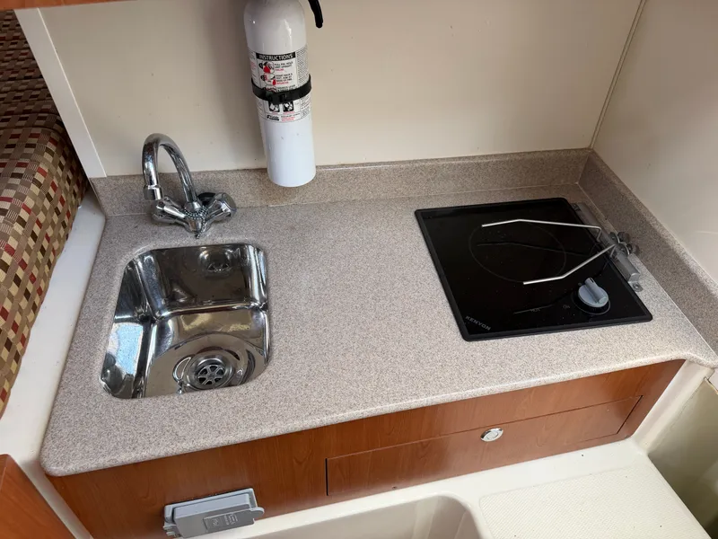 Slide: The Image of Galley in a 2016 World Cat 320 EC boat. - 39