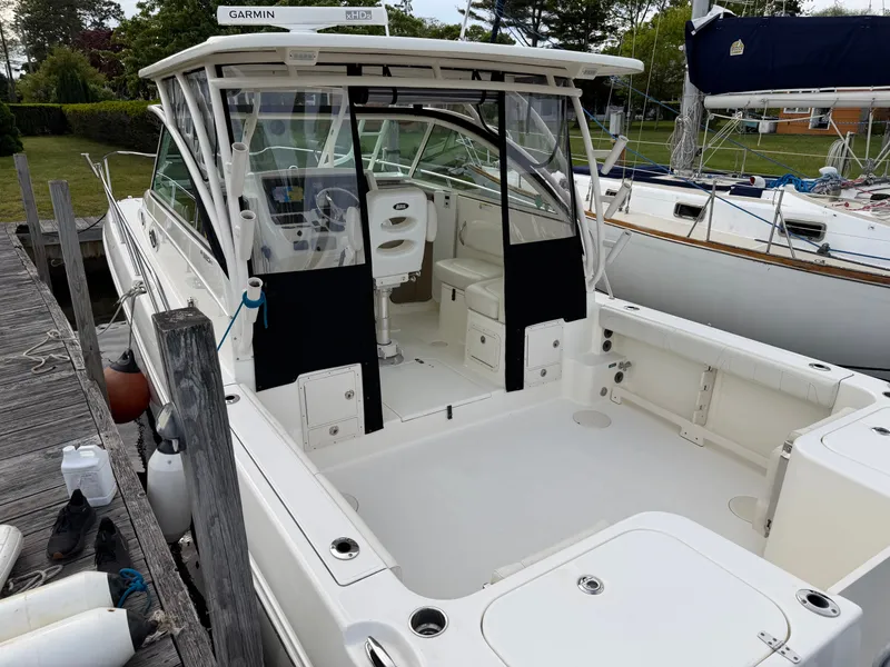 Slide: The Image of 2016 World Cat 320 EC boat at dock, interior view. - 7