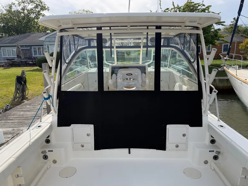 Slide: The Image of 2016 World Cat 320 EC boat at dock, interior view. - 8