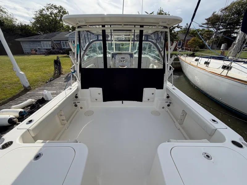 Slide: The Image of Interior view of a 2016 World Cat 320 EC boat at dock. - 9
