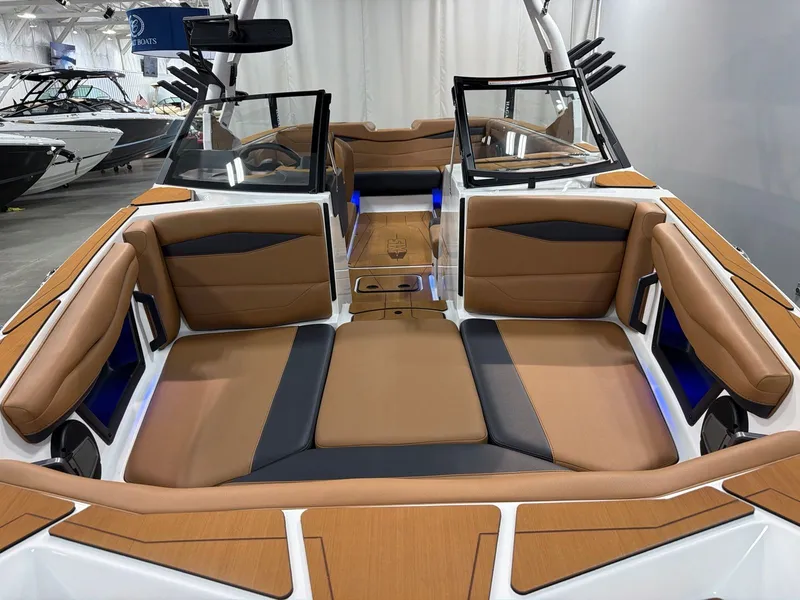 Slide: The Image of Interior of Axis A245 boat, 2026 model, featuring brown leather seats. - 10