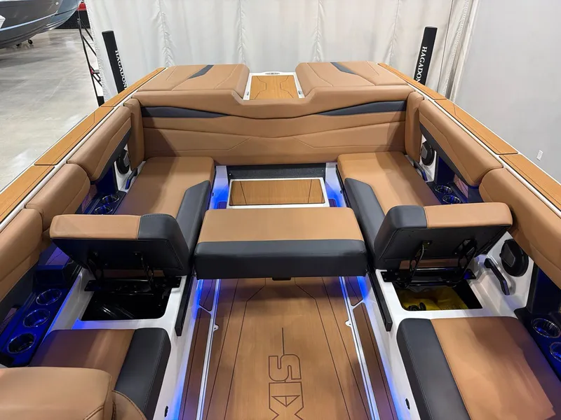 Slide: The Image of Interior of a 2026 Axis A245 boat with luxurious leather seating. - 16