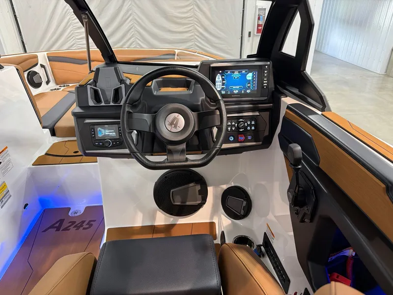 Slide: The Image of Interior of Axis A245 boat, 2026 model, featuring modern control console. - 20