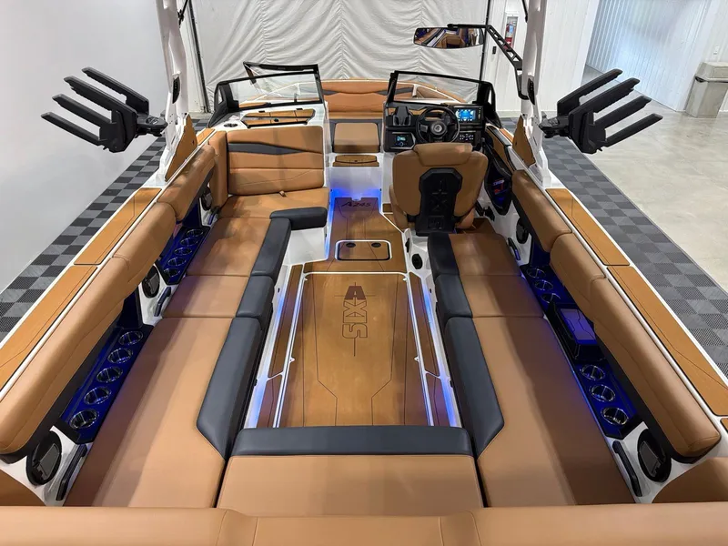 Slide: The Image of Interior of Axis A245 boat, 2026 model, featuring luxurious leather seating. - 7