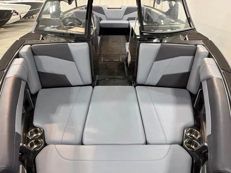 Slide: The Image of Interior of Axis T250 boat, 2026 model, featuring gray upholstery. - 11