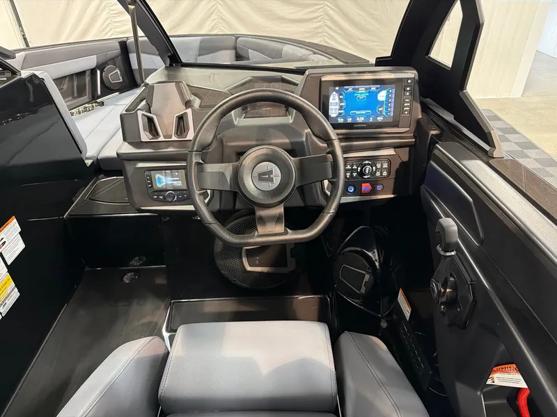 Slide: The Image of Interior of 2026 Axis T250 featuring modern dashboard and steering wheel. - 17