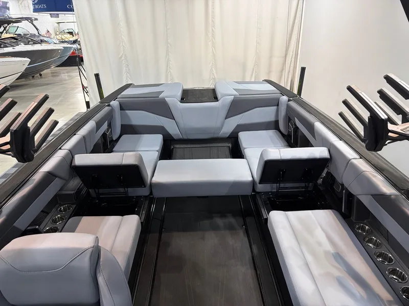 Slide: The Image of Interior of Axis T250 boat, 2026 model, featuring gray upholstery. - 20