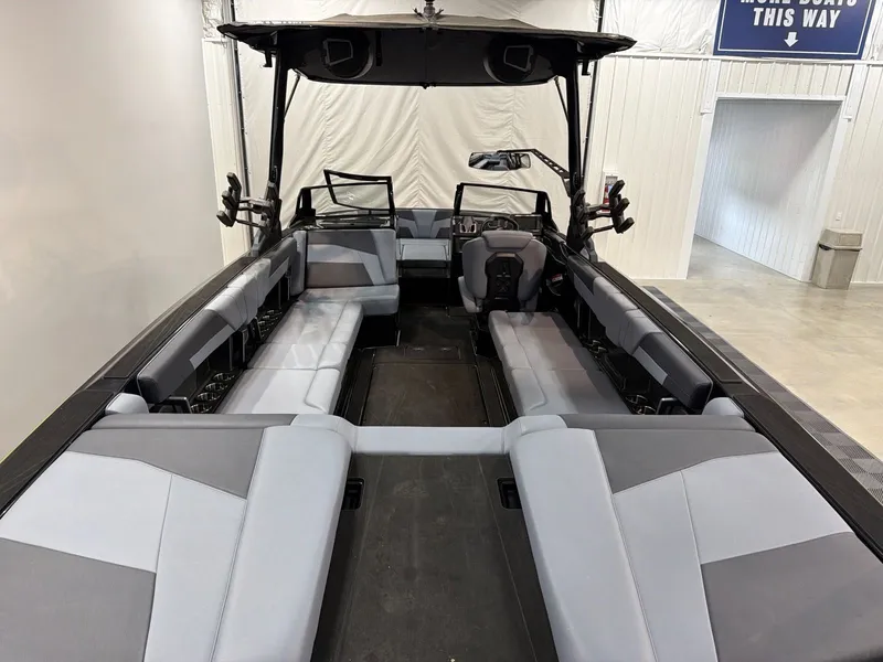 Slide: The Image of Interior of 2026 Axis T250 boat with gray upholstery. - 6