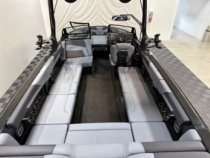 Slide: The Image of Interior of Axis T250 boat, 2026 model, featuring gray upholstery. - 7