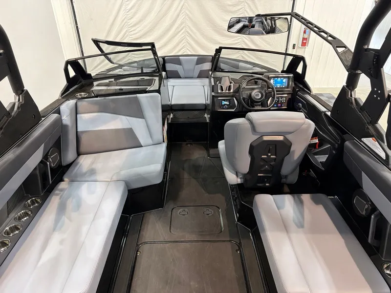 Slide: The Image of Interior of 2026 Axis T250 boat with modern seating and controls. - 8