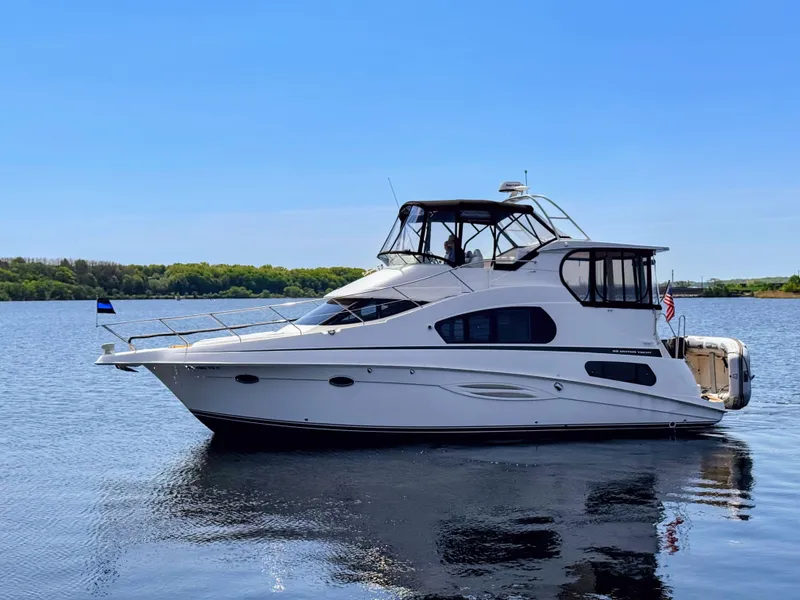 The Image of 2002 Silverton 39 Motor Yacht on calm water. - 0