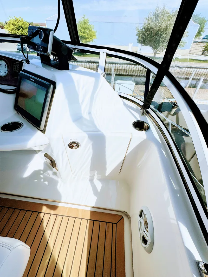 Slide: The Image of Interior of a 2002 Silverton 39 Motor Yacht with wooden flooring. - 14